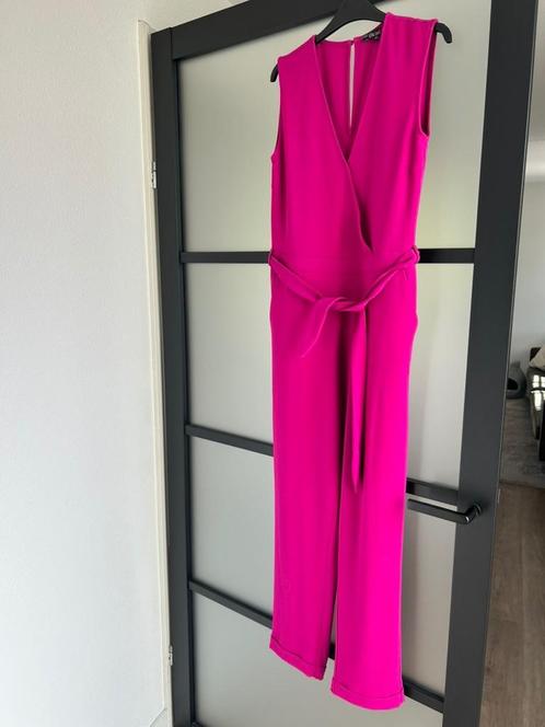 King Louie maat 42 fuchsia roze jumpsuit 2336, Kleding | Dames, Jumpsuits, Zo goed als nieuw, Maat 42/44 (L), Roze, Ophalen of Verzenden