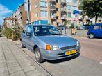 Toyota Starlet 1.3 16V 1999 Grijs, Auto's, Voorwielaandrijving, 74 pk, 4 cilinders, Starlet