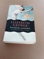 Elizabeth George - Een duister vermoeden, Ophalen of Verzenden, Gelezen, Elizabeth George