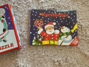 Voor de kleintjes (3) grote kerst puzzel en boekje +liedjes beschikbaar voor biedingen