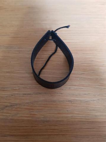 Zwart bruine armband beschikbaar voor biedingen