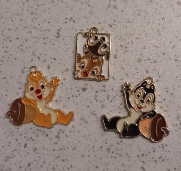 Metalen bedel knabbel en babbel "nieuw" beschikbaar voor biedingen