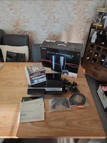 Sony Playstation 3 Phat in doos met 9 games en 1 controller beschikbaar voor biedingen
