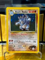 Brock's Rhydon (GH 2) Gym Heroes, Hobby en Vrije tijd, Verzamelkaartspellen | Pokémon, Ophalen of Verzenden, Zo goed als nieuw