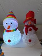 2 sneeuwpoppetjes op batterijen, Ophalen