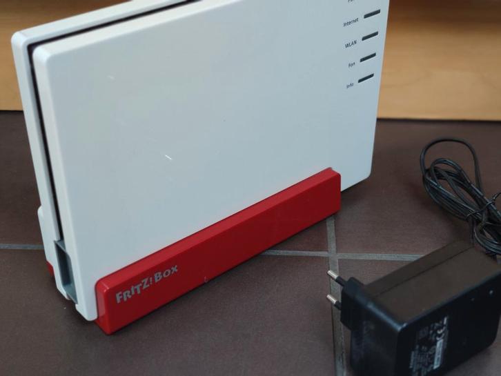 FRITZ!Box 7581 Router, Computers en Software, Routers en Modems, Zo goed als nieuw, Router, Ophalen of Verzenden