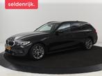 BMW 3-serie 330e Sport Line | Adaptive cruise | Stoelverwarm, 1998 cc, Gebruikt, 4 cilinders, Zwart