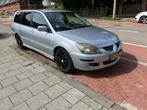 Mitsubishi Lancer 1.6 MPI Stationwagon 2005 Grijs, Auto's, Mitsubishi, Voorwielaandrijving, Stof, 4 cilinders, 400 kg