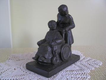 De Zonnebloem * fraai beeld * mens helpt mede-mens *  beschikbaar voor biedingen