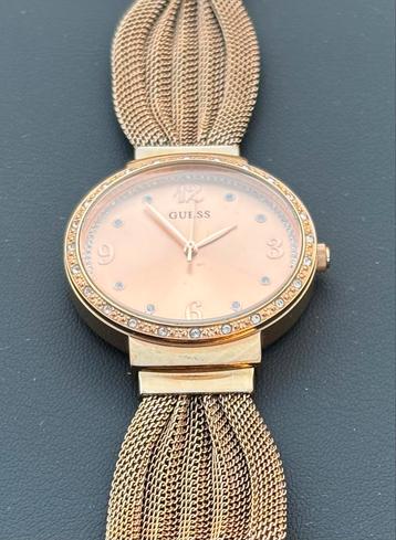 Guess rosegoudkleur  dames horloge ️ beschikbaar voor biedingen