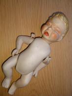 Babypopje klein met schade. Over de borst loopt, Ophalen of Verzenden