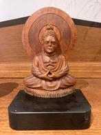 Alcide Mathieux houten boeddha op stenen sokkel., Ophalen of Verzenden, Zo goed als nieuw