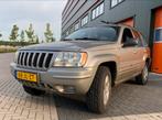 Jeep Grand Cherokee 4.0 I AUT 2002 Grijs, Auto's, Jeep, Automaat, Zwart, 190 pk, 109 €/maand