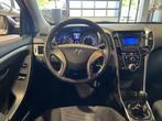 Hyundai i30 CW 1.4i i-Drive Airco | Xenon | Cruise control, Auto's, Te koop, Zilver of Grijs, Geïmporteerd, Benzine