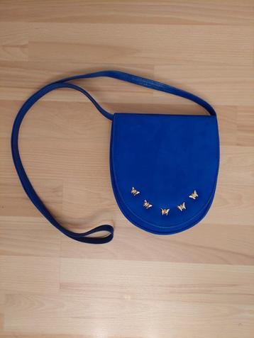 Kobalt blauw tasje met gouden vlinders beschikbaar voor biedingen