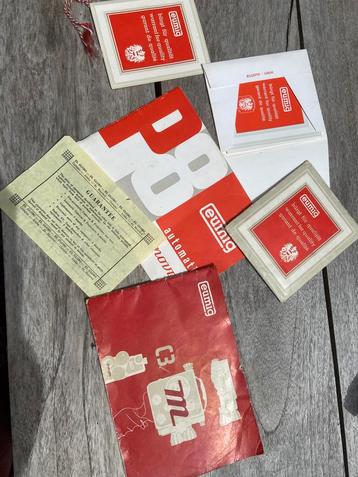 Vintage Eumig boekjes en garantiebewijs beschikbaar voor biedingen