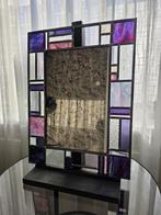 Glas in lood spiegel, Ophalen