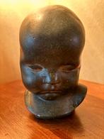 Beeldje van babyhoofdje van Gebr. van Paridon nr. 521, Ophalen