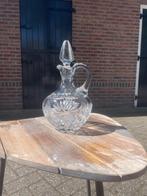 Kristallen karaf met geslepen patroon, Ophalen
