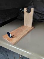 Houten Hamhouder, Ophalen