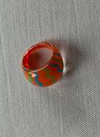 Oranje ring kunsstof, Sieraden, Tassen en Uiterlijk, Ringen, Kunststof, Gebruikt, Oranje, Ophalen of Verzenden