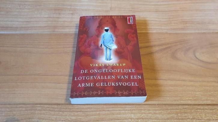 Boek van Slumdog Millionaire: de ongelooflijke... Voor €2, Boeken, Romans, Zo goed als nieuw, Wereld overig, Ophalen
