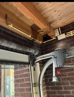 Te koop electrisch bedienbare garagedeur, Doe-het-zelf en Verbouw, Ophalen of Verzenden, 120 cm of meer, Garagedeur, 215 cm of meer