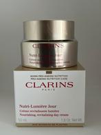 Clarins Nutri-Lumiere Revitalizing Day Cream 50 ml, Sieraden, Tassen en Uiterlijk, Uiterlijk | Gezichtsverzorging, Nieuw, Gehele gezicht