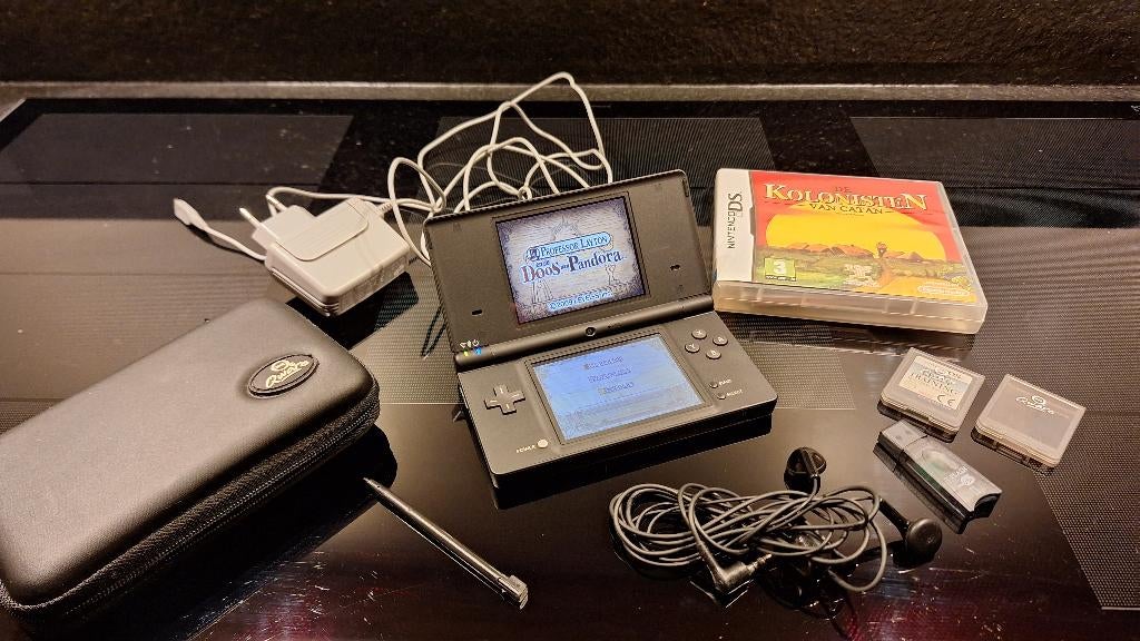 Nintendo DS Lite met spellen, Spelcomputers en Games, Spelcomputers | Nintendo DS, Zwart, Ophalen of Verzenden, Zo goed als nieuw