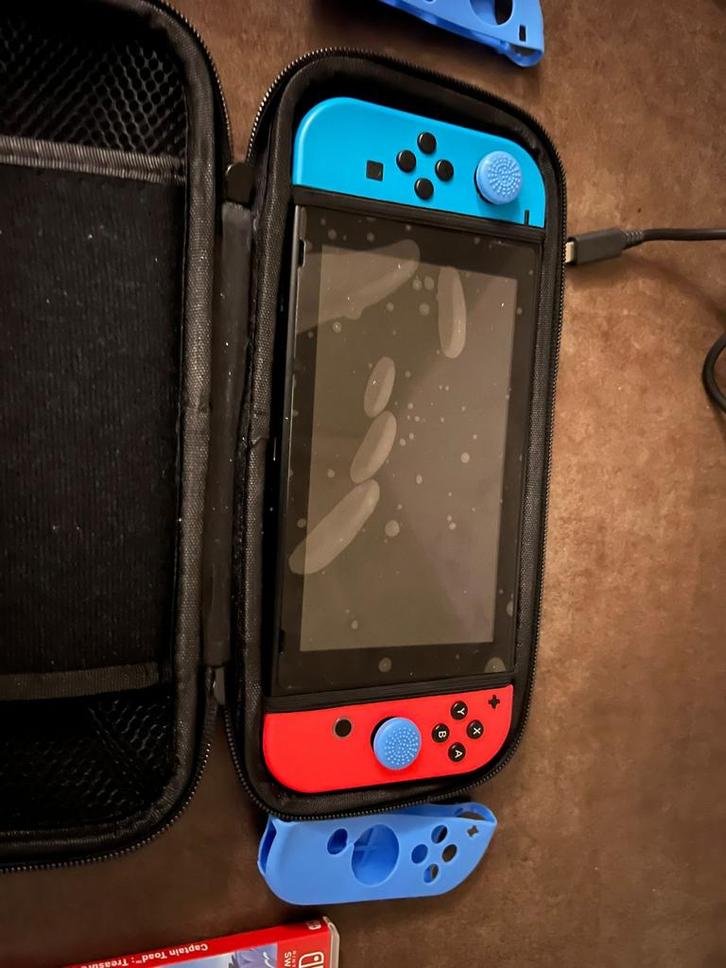 Nintendo Switch met games en accessoires, Spelcomputers en Games, Spelcomputers | Nintendo Switch, Gebruikt, Switch Original, Met 3 controllers of meer