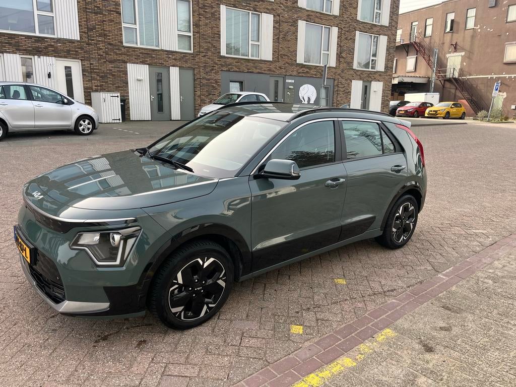 Kia Niro 64,8 kWh 204pk Aut 2023 Groen SOH100%, Auto's, Kia, Particulier, Niro, ABS, Achteruitrijcamera, Adaptieve lichten, Adaptive Cruise Control