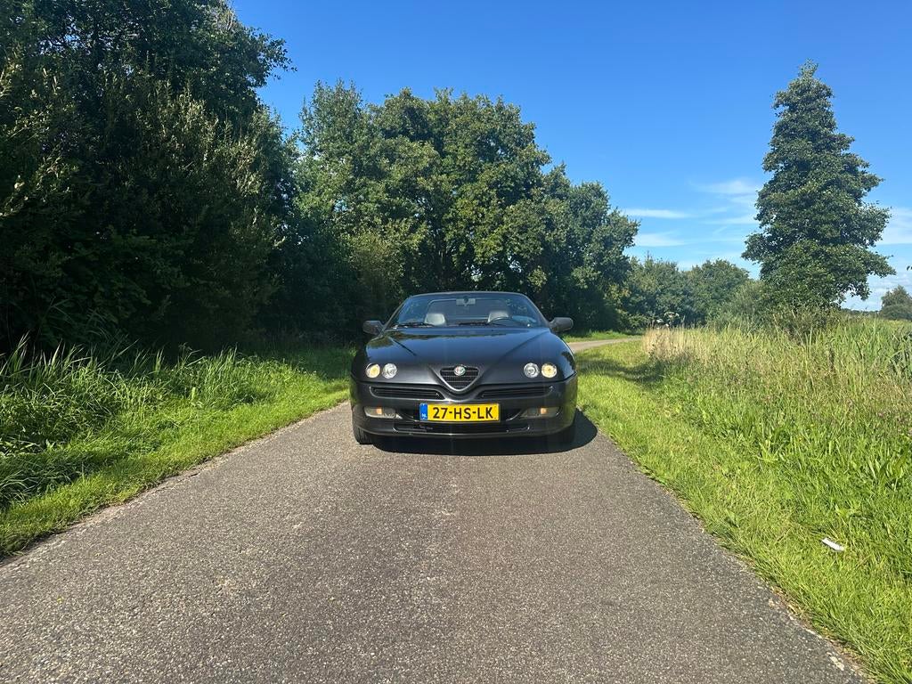 Alfa Romeo Spider 2.0 Twin Spark 16V 1997 Cappuccetto Rosso, Auto's, Alfa Romeo, Voorwielaandrijving, 1345 kg, Zwart, 4 cilinders