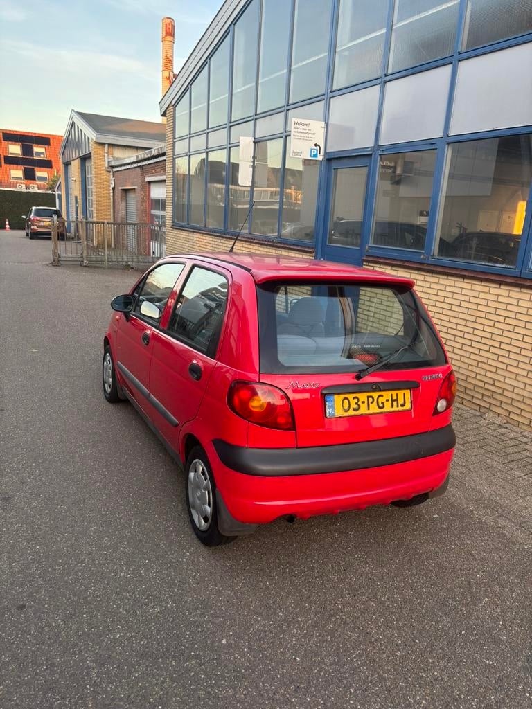 Daewoo Matiz 1.0 2004 Rood met Carplay, Auto's, Daewoo, Voorwielaandrijving, 15 km/l, 64 pk, 771 kg