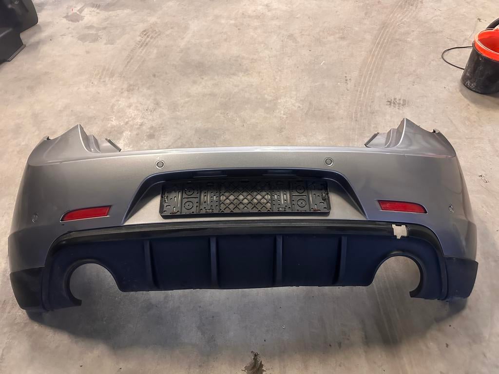 Alfa Guiletta achterbumper met pdc en Diffuser kleur 318, Ophalen, Gebruikt, Alfa Romeo, Achter