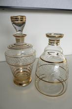 2 glazen karaffen, geslepen figuren en goud decoratie., Ophalen of Verzenden