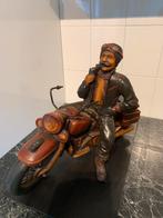 Pracht motorrijder op motor, Ophalen