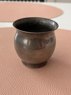 Kleine tinnen beker, Ophalen