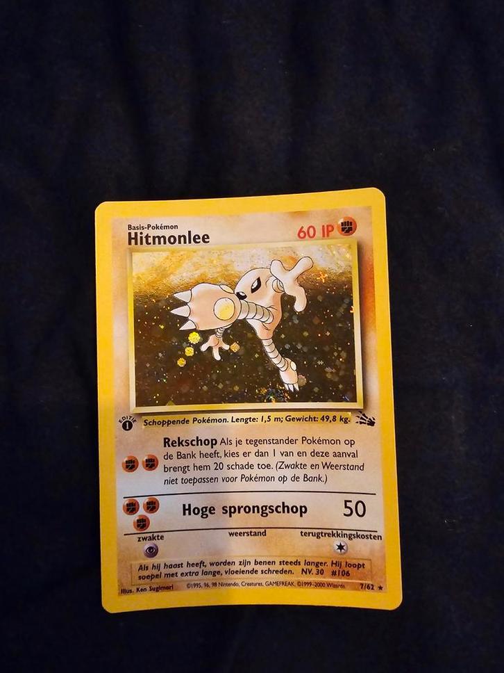 Hitmonlee 7/62 Fossil 1st Edition Nederlands NM, Hobby en Vrije tijd, Verzamelkaartspellen | Pokémon, Zo goed als nieuw, Losse kaart