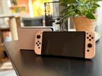 Nintendo Switch OLED - met 2 spellen + extra’s, Spelcomputers en Games, Switch OLED, Met games, Met 2 controllers, Ophalen of Verzenden