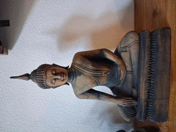 mooie houten boeddha beschikbaar voor biedingen