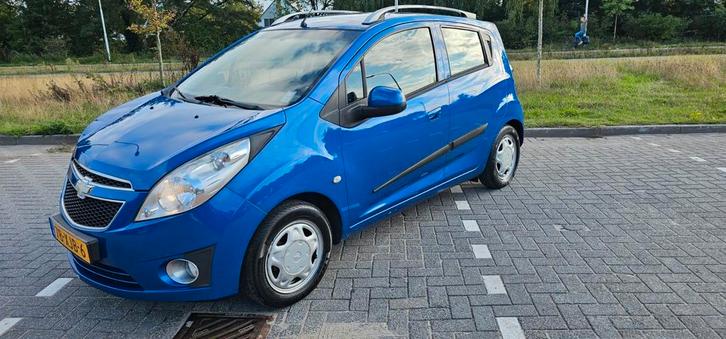 Chevrolet Spark 1.0 Bifuel LPG 2012 Blauw nieuwe apk! 1e eig, Auto's, Chevrolet, Particulier, Spark, ABS, Airbags, Airconditioning