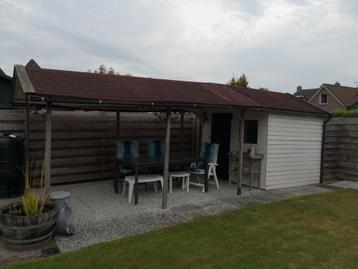 tuinhuisje met overkapping  beschikbaar voor biedingen