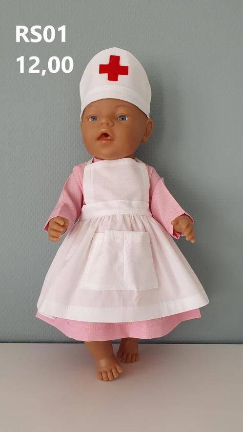 Poppenkleertjes baby pop set. Opbrengst KiKa., Kinderen en Baby's, Speelgoed | Poppen, Nieuw, Babypop, Ophalen
