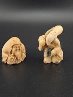 Twee Japanse Netsuke beeldjes, Antiek en Kunst, Kunst | Niet-Westerse kunst, Ophalen of Verzenden