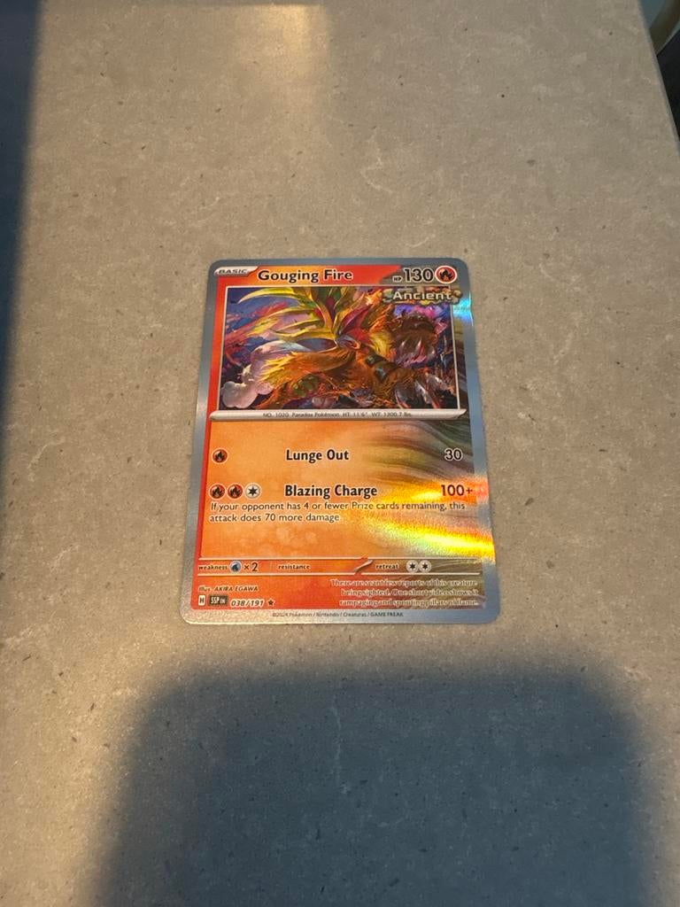 Gouging Fire 038/191 Holo Surging Sparks NM, Ophalen of Verzenden, Zo goed als nieuw, Losse kaart, Foil