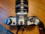 Te koop Canon AE-1 met lens en flitser, Ophalen of Verzenden, Zo goed als nieuw, Spiegelreflex, Canon