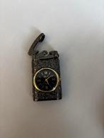 Aansteker met klok, Ophalen, Aansteker