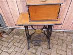Zeer oude Nauman Singer naaimachine., Ophalen