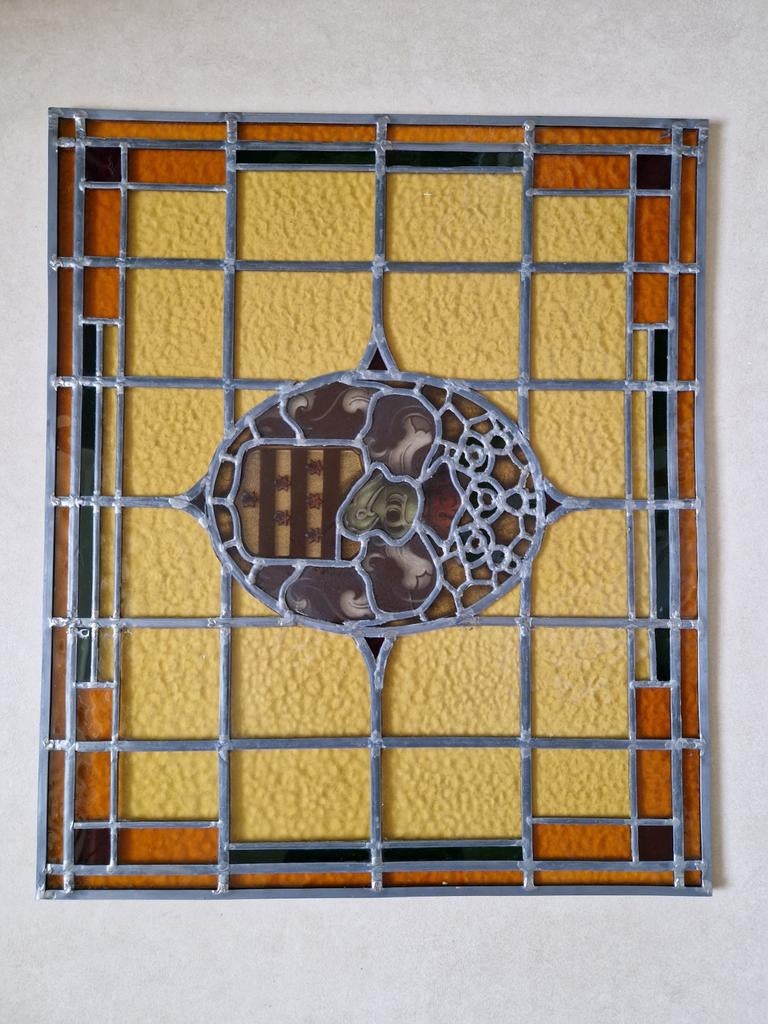 Glas in lood raam met familie wapen van Dunnewold., Ophalen