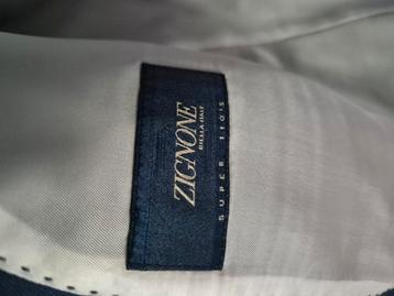 Donkerblauw pak. Maat 26. beschikbaar voor biedingen